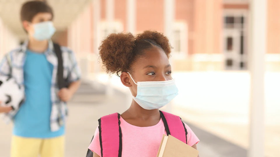 Should I Send My Child Back To School Amid COVID? Experts Weigh In On Risks & Benefits